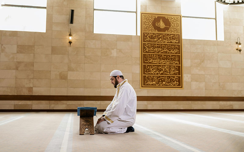 Man Praying at Mosque